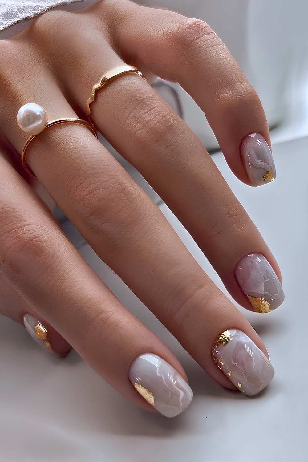 Short Almond Grey Marble with Gold Foil — Winter Marble Nails