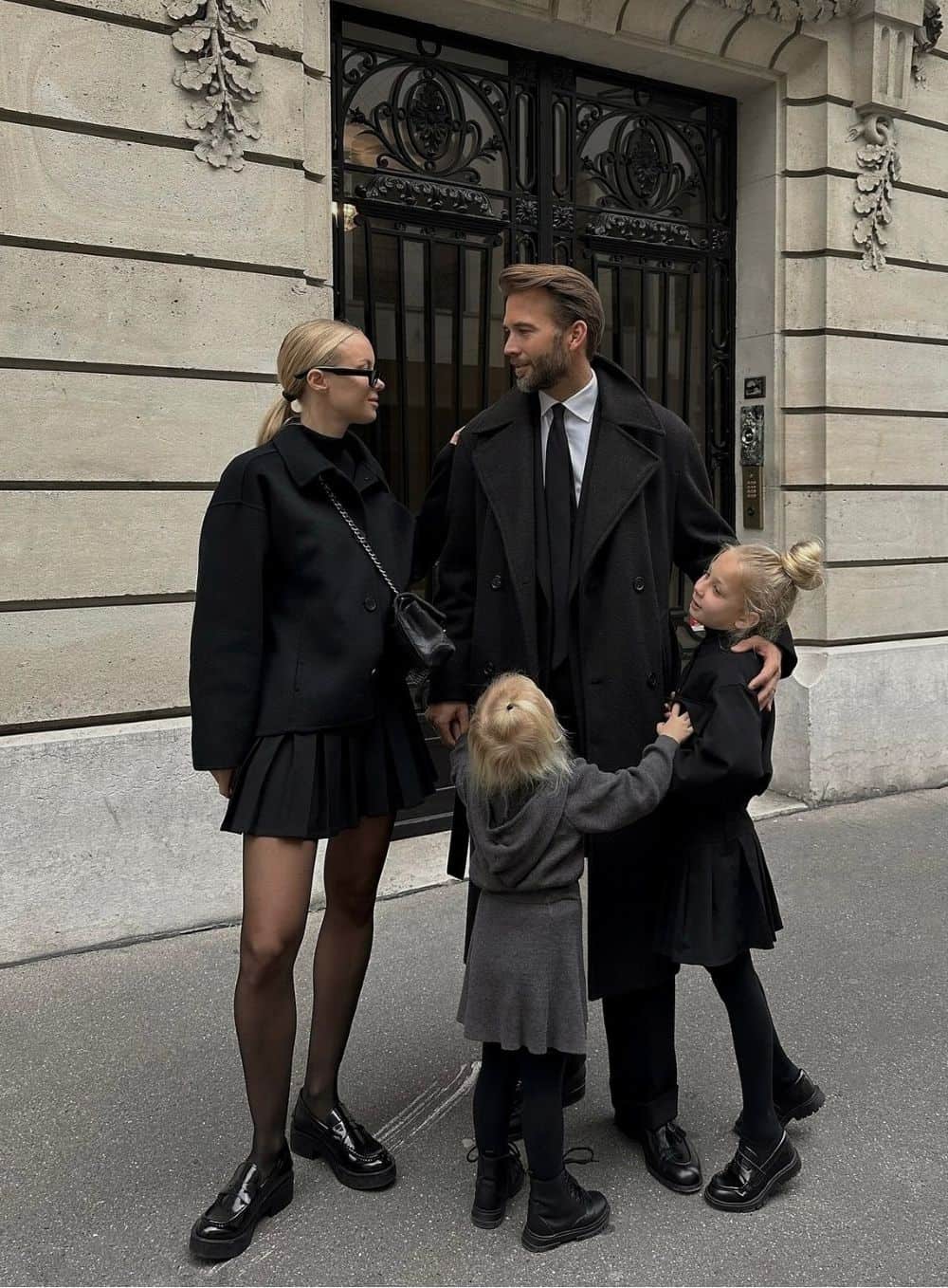 Chic Monochromatic Black and Grey: Tailored Coats for a Sophisticated Family Photo Chic Monochromatic Black and Grey: Tailored Coats for a Sophisticated Family Photo β Winter Family Photo Outfits