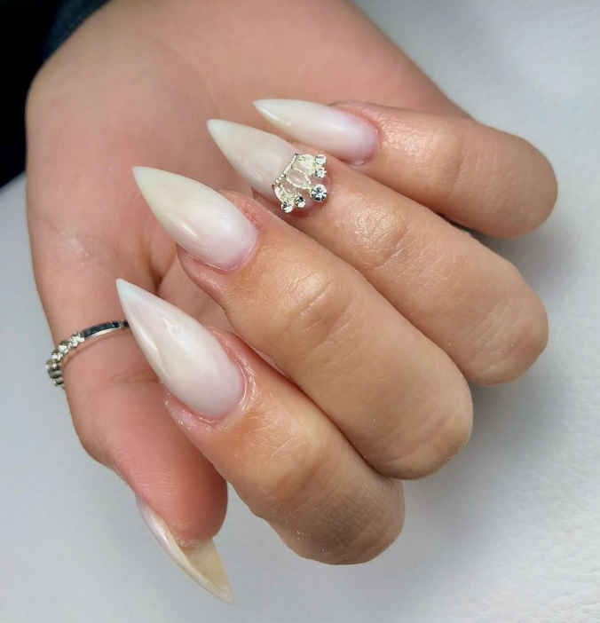 Milky White Stiletto Nails with Crown Rhinestone Milky White Stiletto Nails with Crown Rhinestone β Milky White Nails