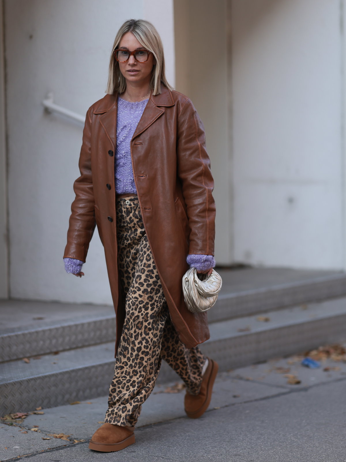 Edgy Ensemble: Ugg Boots with Leopard Trousers and Leather Trench Edgy Ensemble: Ugg Boots with Leopard Trousers and Leather Trench β Ugg Slippers Outfits