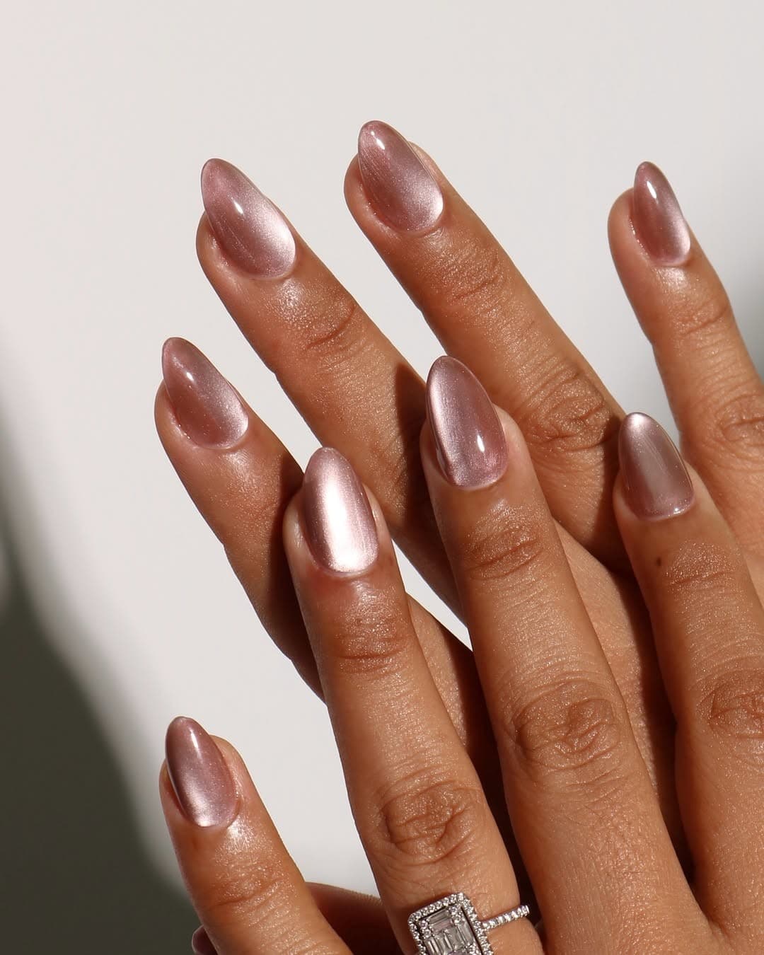 Rose Gold Cat-Eye Almond Nails Rose Gold Cat-Eye Almond Nails β Winter Nail Trends