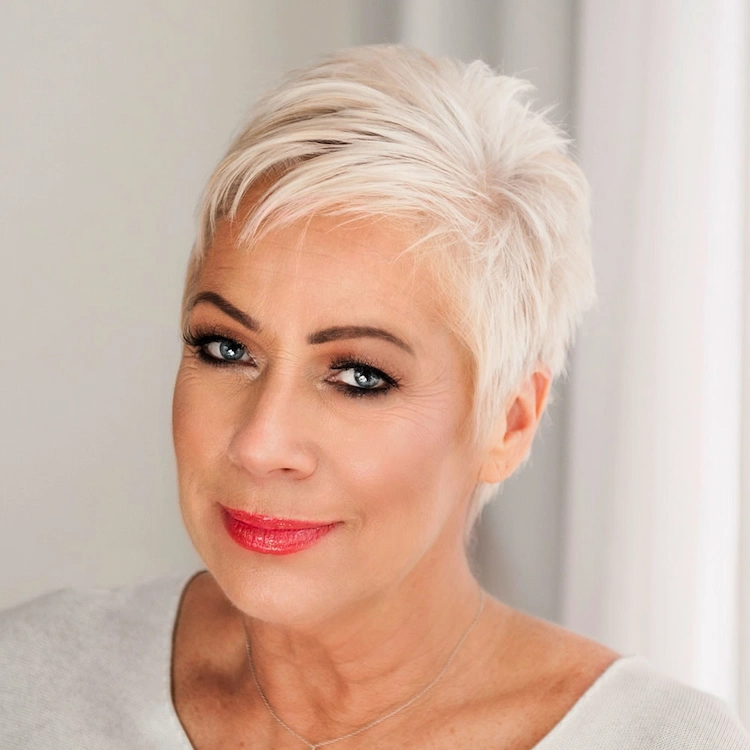 Platinum Blonde Pixie With Side Swept Bangs — Winter Haircuts for Women Over 70