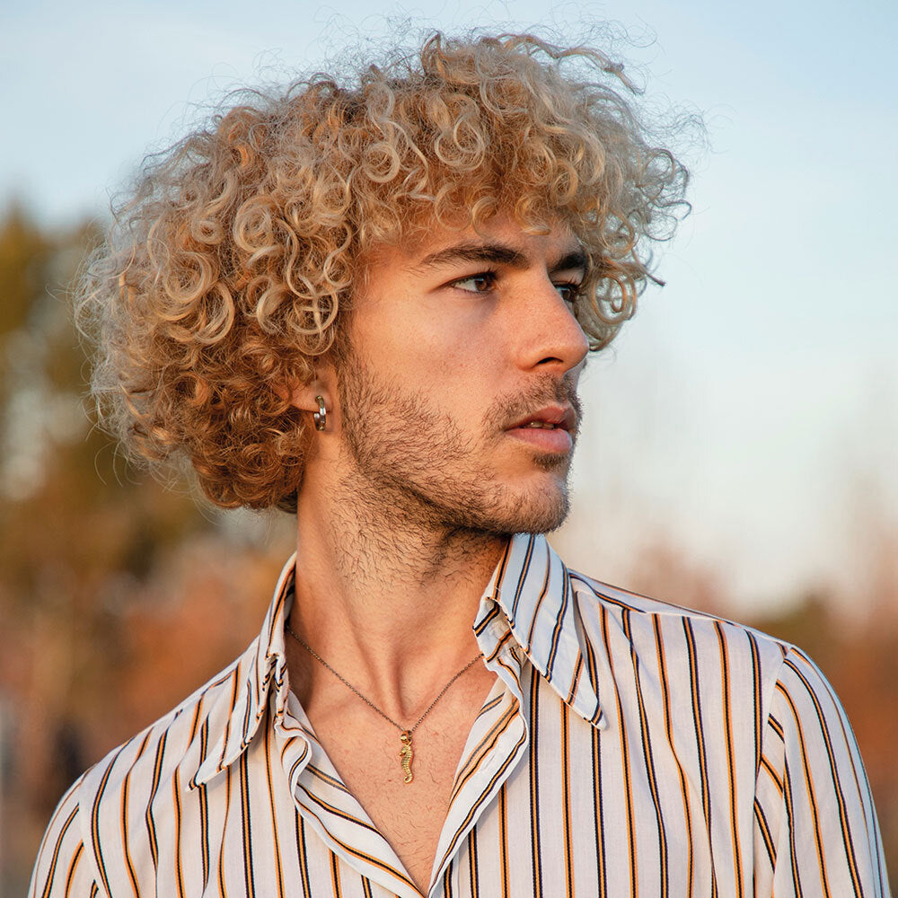 Ash Blonde Medium Curly Fringe — Winter Hairstyles for Men