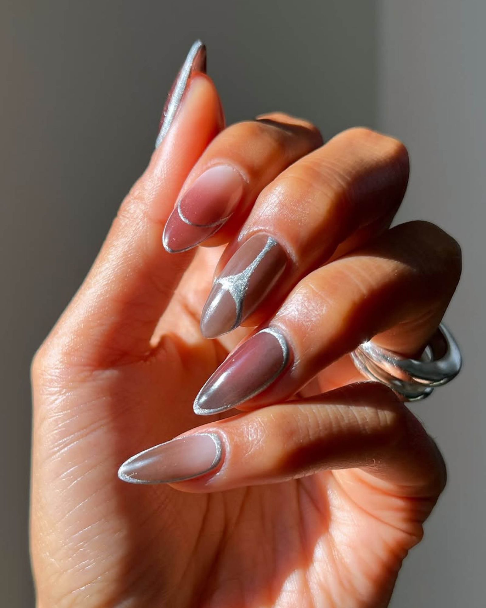 Pearlescent White and 3D Chrome Accents Pearlescent White and 3D Chrome Accents β Silver Chrome Nails