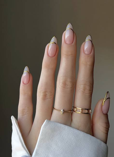 Sheer Pink French with Gold Line Art Sheer Pink French with Gold Line Art β Long Winter Almond Nails