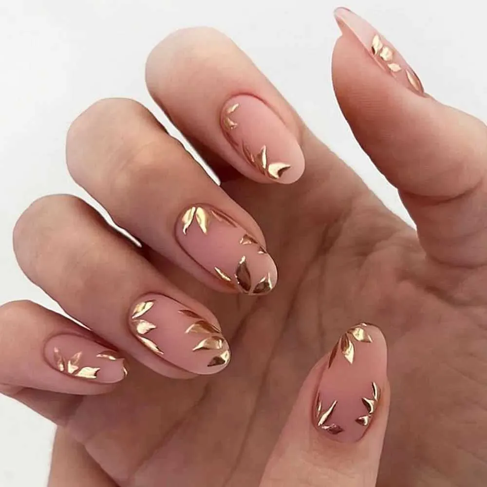 Matte Nude And Gold Leaf Winter Nails Matte Nude And Gold Leaf Winter Nails β Medium Winter Almond Nails
