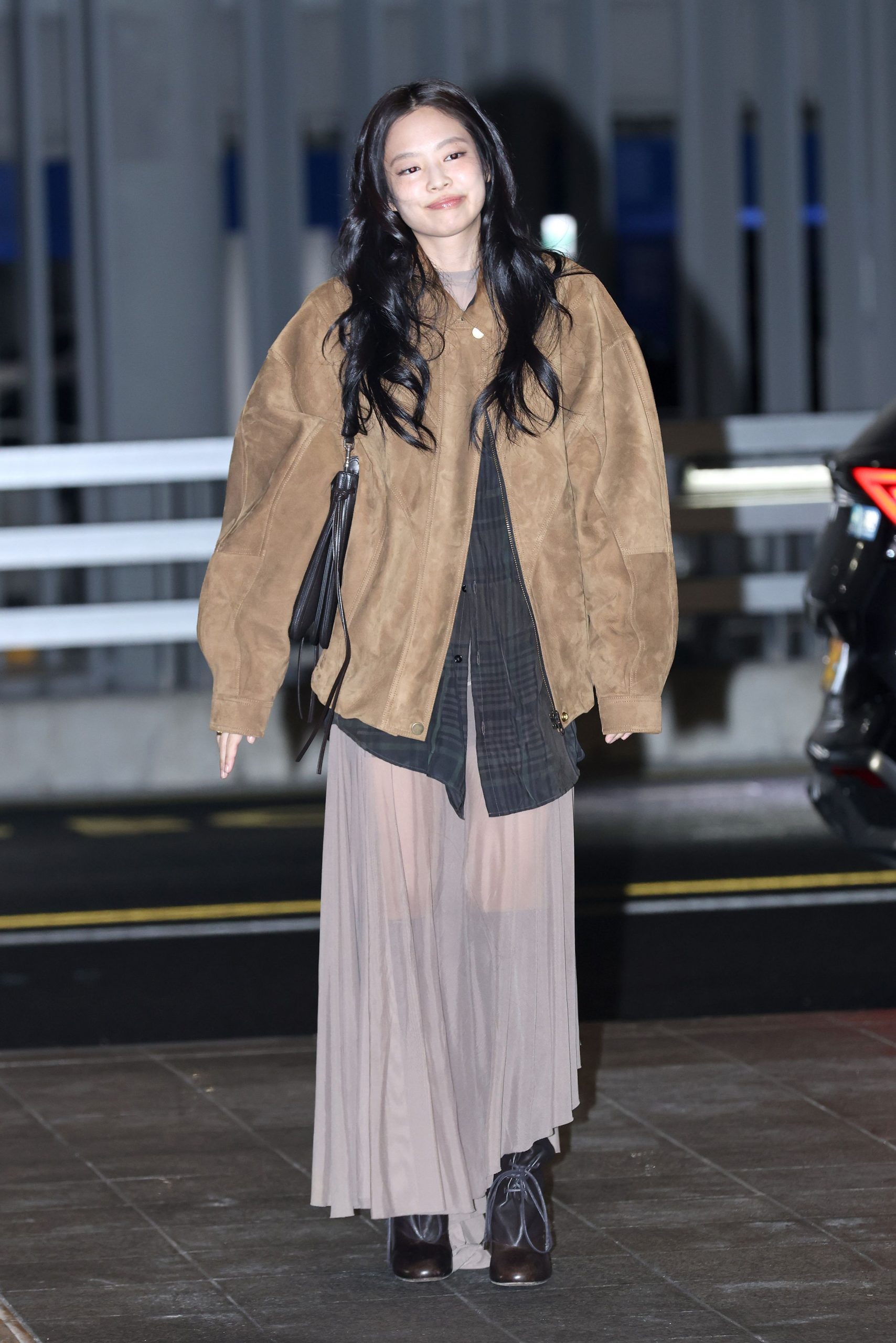 Brown Suede Jacket with Plaid Shirt and Sheer Skirt for an Unexpected Airport Look Brown Suede Jacket with Plaid Shirt and Sheer Skirt for an Unexpected Airport Look β Winter Airport Outfits