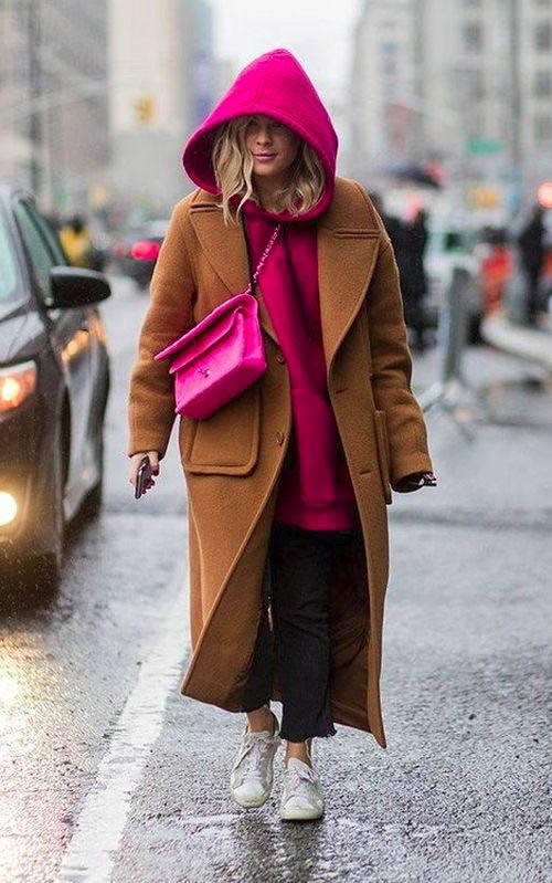 Long Camel Coat Over A Bright Pink Hoodie And Sneakers — Camel Coat Outfits