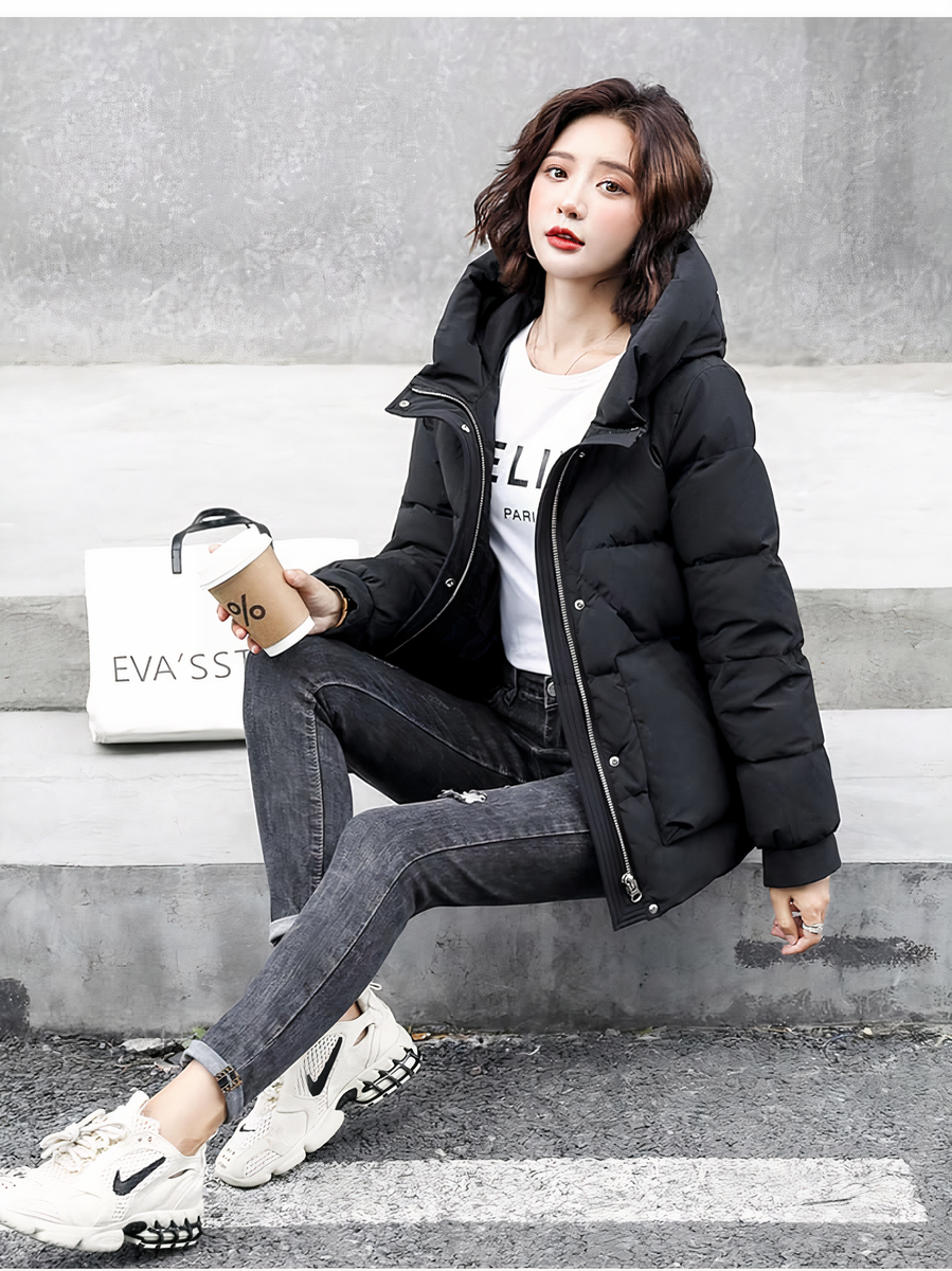 Black Puffer Jacket with Large Hood and Grey Jeans — Winter Puffer Jacket Outfits