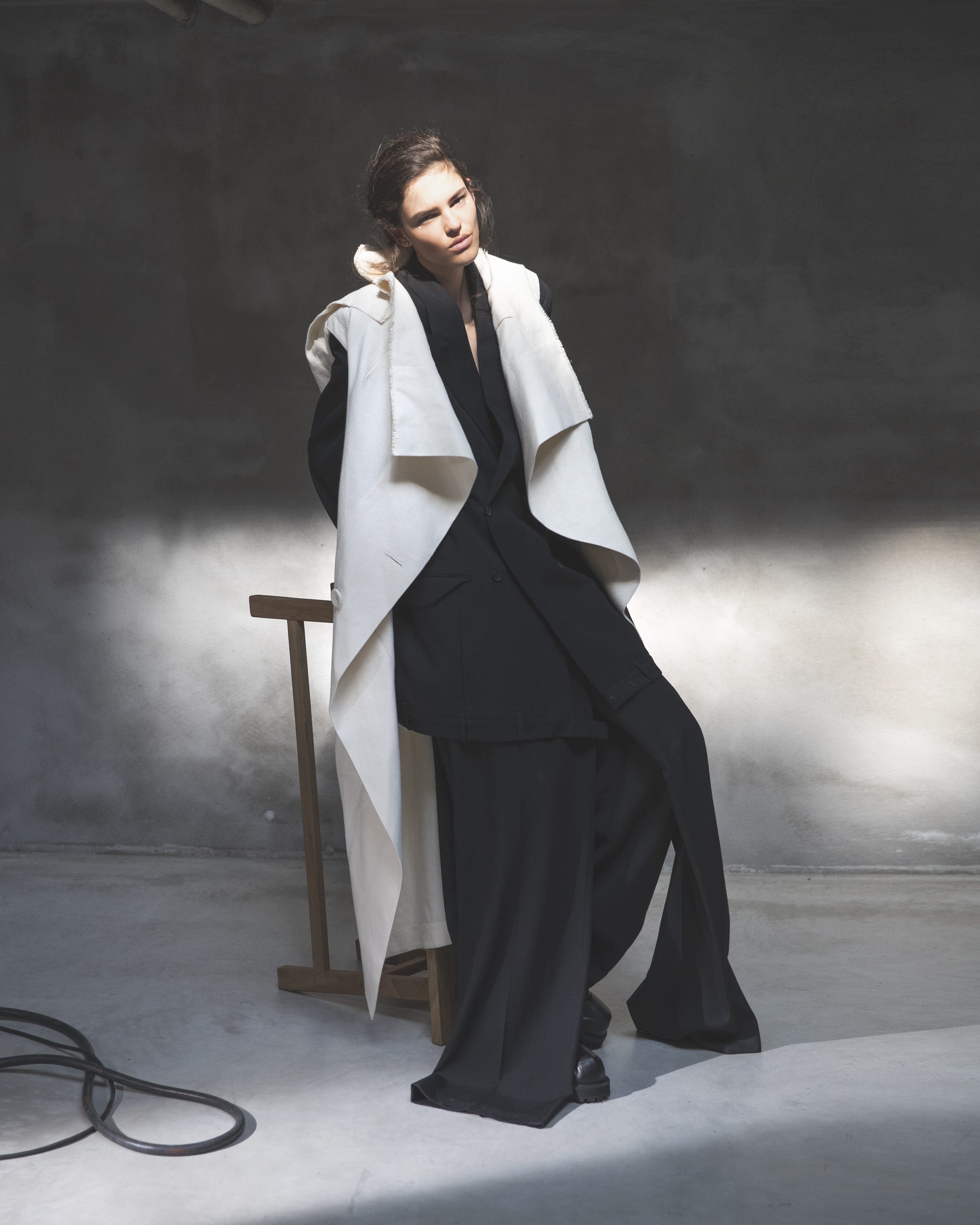 Black Blazer, White Vest, and Wide-Leg Trousers for Classic Photoshoots Black Blazer, White Vest, and Wide-Leg Trousers for Classic Photoshoots β Winter Photoshoot Outfits