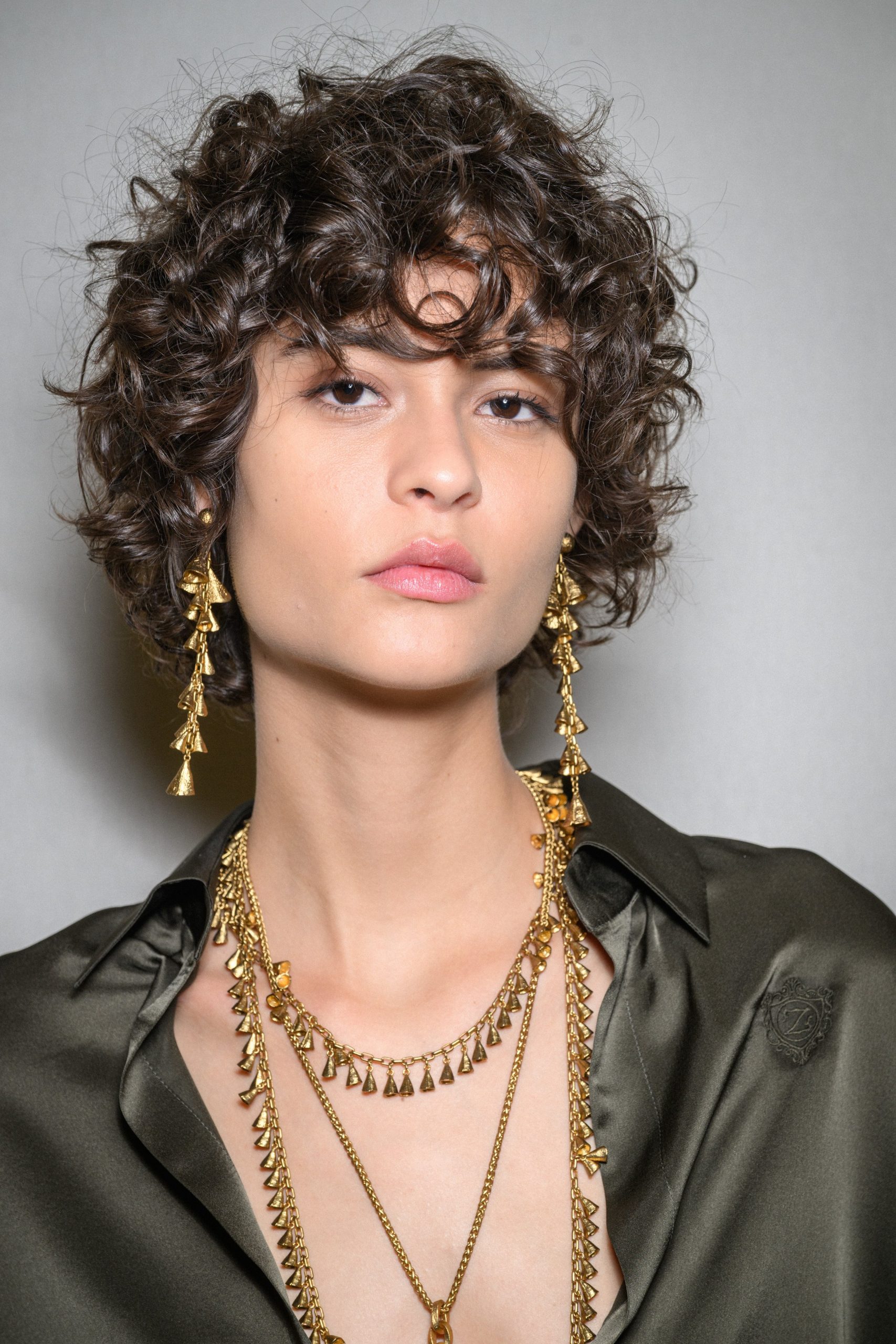 Chin Length Curly Shag With Choppy Fringe Chin Length Curly Shag With Choppy Fringe β Winter Hairstyles for Curly Hair