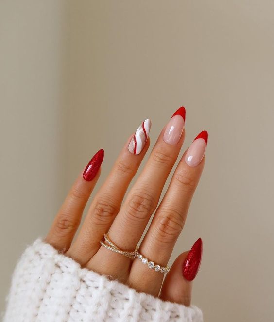 Long Almond Nails with Red French Tips and Art Accents — Red Christmas Nails 2026