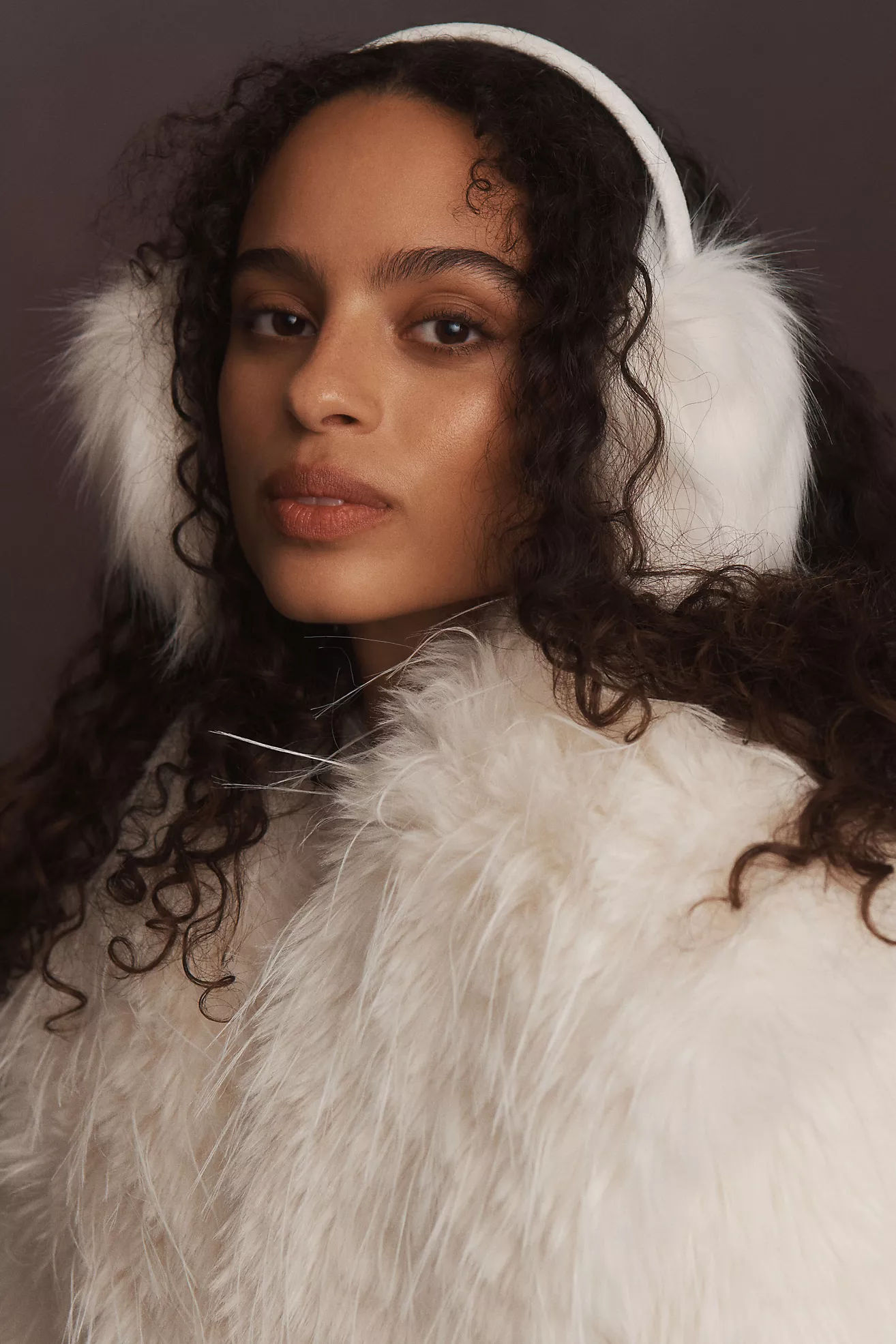 White Furry Earmuffs Complementing a White Furry Coat White Furry Earmuffs Complementing a White Furry Coat β Earmuffs Outfits