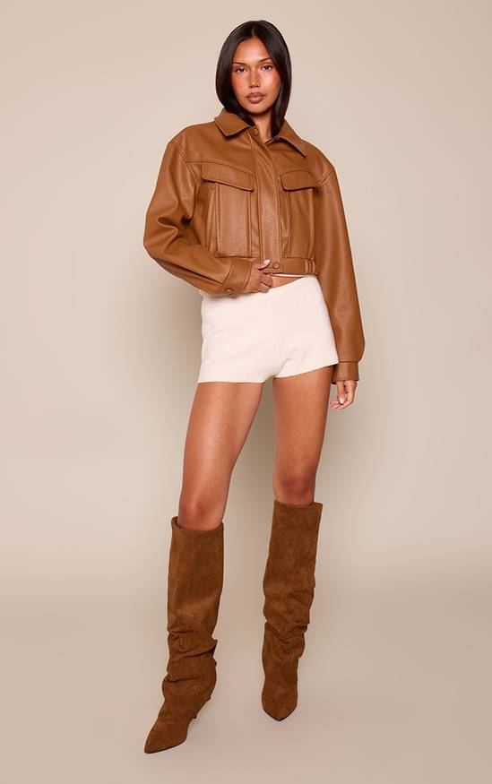 Textured Mix: Slouchy Boots, Textured Shorts, Faux Leather Jacket — Knee High Boots Outfits