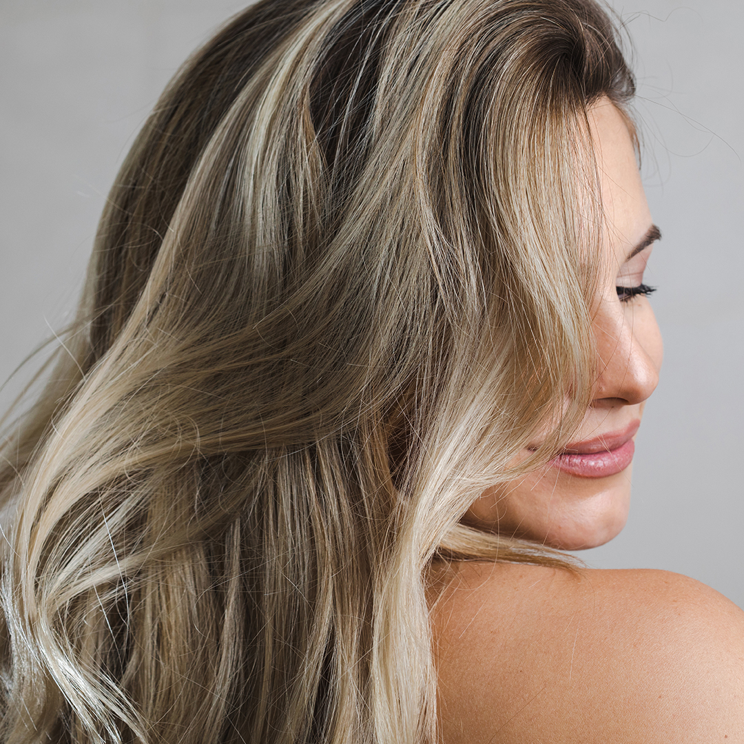 Ash Blonde With Darker Roots — Winter Hair Colors for Plus Size Women