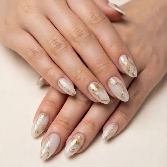 Off White Base With Abstract Gold Foil Off White Base With Abstract Gold Foil β Winter Nail Colors for Women Over 40