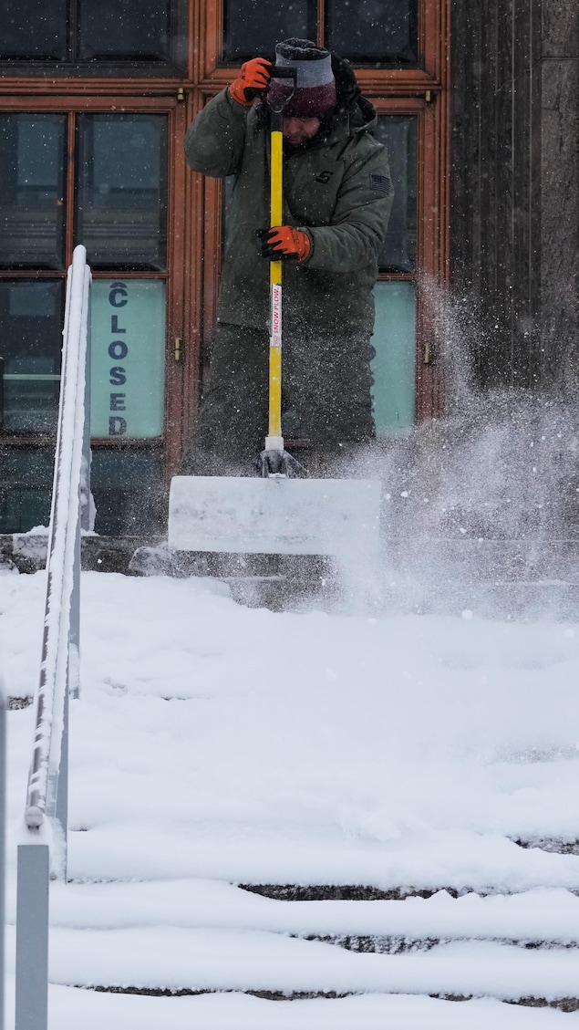 Green Puffer Jacket and Beanie for Snow Shoveling — Chicago Winter Outfits