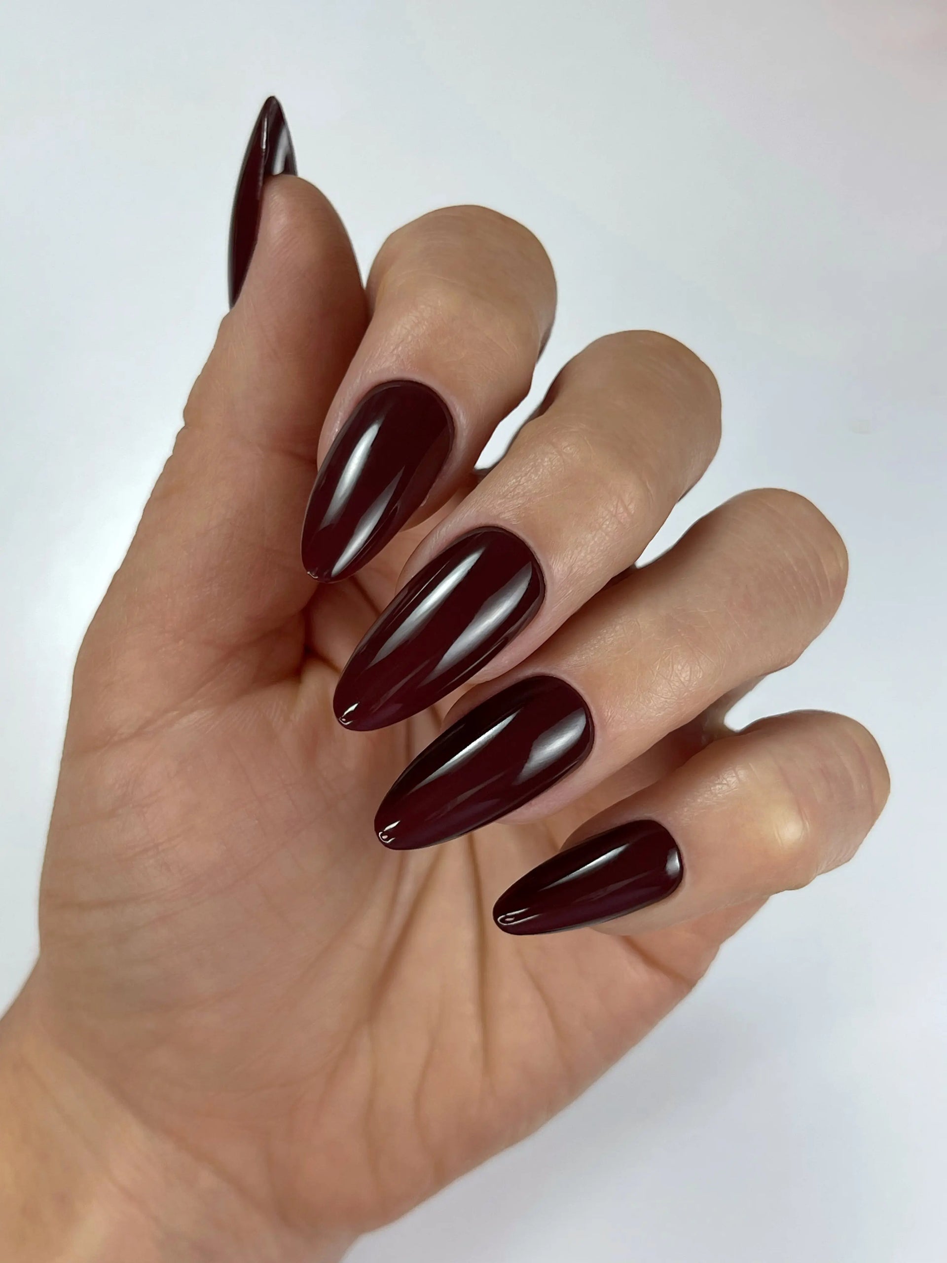Long Almond Glossy Burgundy Nails Long Almond Glossy Burgundy Nails β Burgundy Christmas Nails 2026