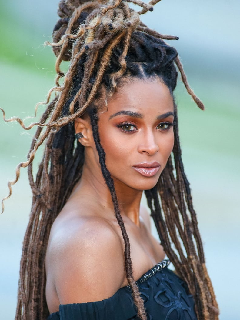 Long Coily Dreadlocks With Blonde Highlights Long Coily Dreadlocks With Blonde Highlights β Winter Protective Hairstyles