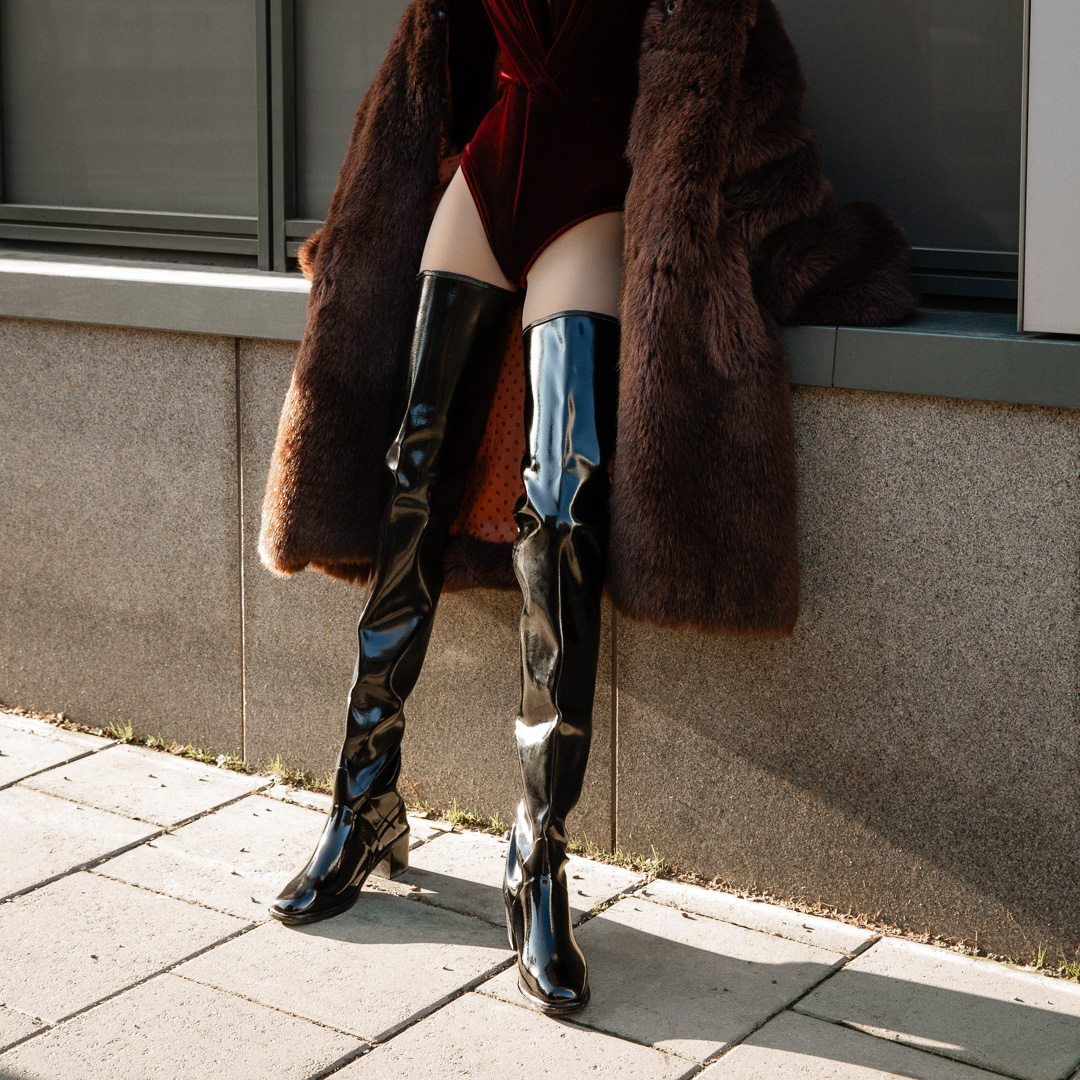 Dramatic Black Patent Boots with Velvet Bodysuit and Faux Fur Coat — Over the Knee Boots Outfits