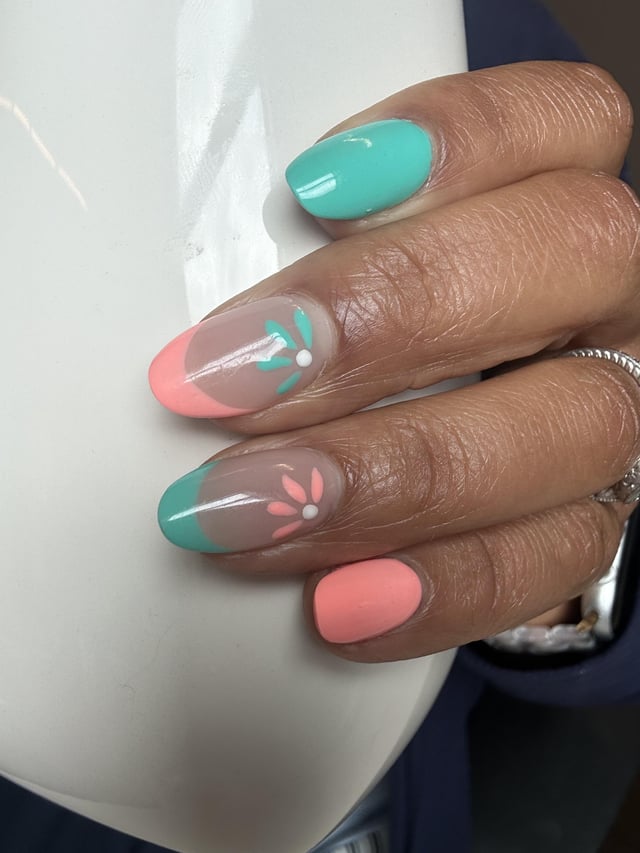 Glossy Coral French Tips with Floral Accent — Holiday Nail Colors 2026