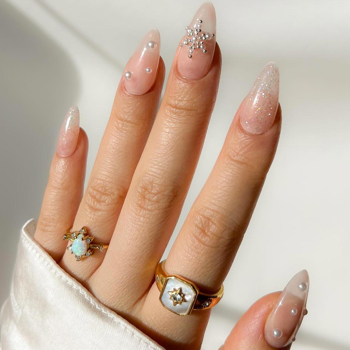 Extra-Long Stiletto with Pearls and Snowflake Charm Extra-Long Stiletto with Pearls and Snowflake Charm β New Years Nail Colors 2027