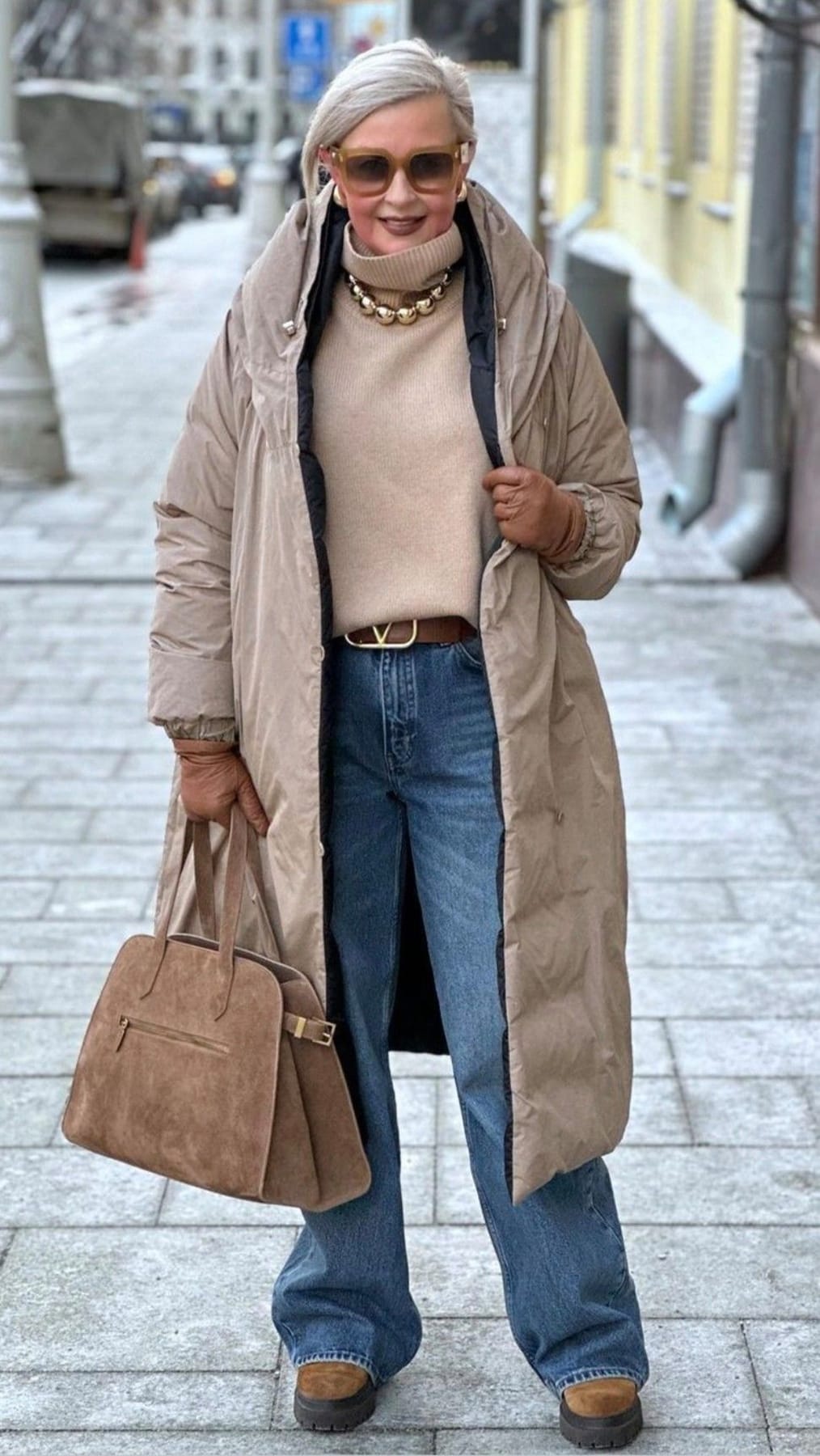 Long Beige Puffer Coat with Turtleneck and Blue Jeans — Winter Puffer Jacket Outfits