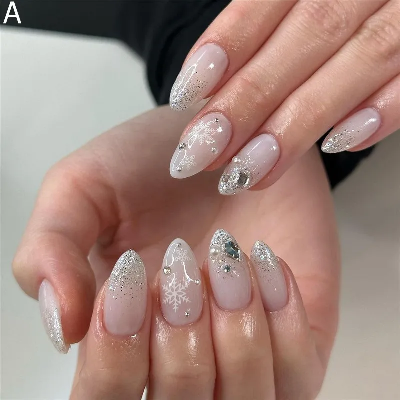 Pale Pink Almonds with Snowflake Decals and Glitter Tips Pale Pink Almonds with Snowflake Decals and Glitter Tips β Snowflake Nails