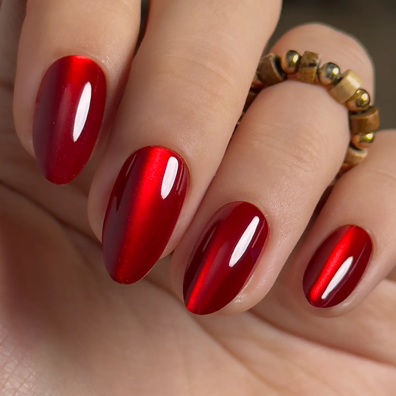 Deep Red Cat-Eye Oval Nails — Medium Length Winter Nails