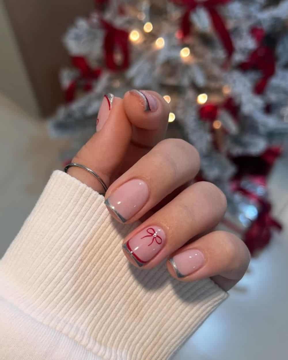 Pale Pink Silver French Bow Nails Pale Pink Silver French Bow Nails β Simple Christmas Nails 2026