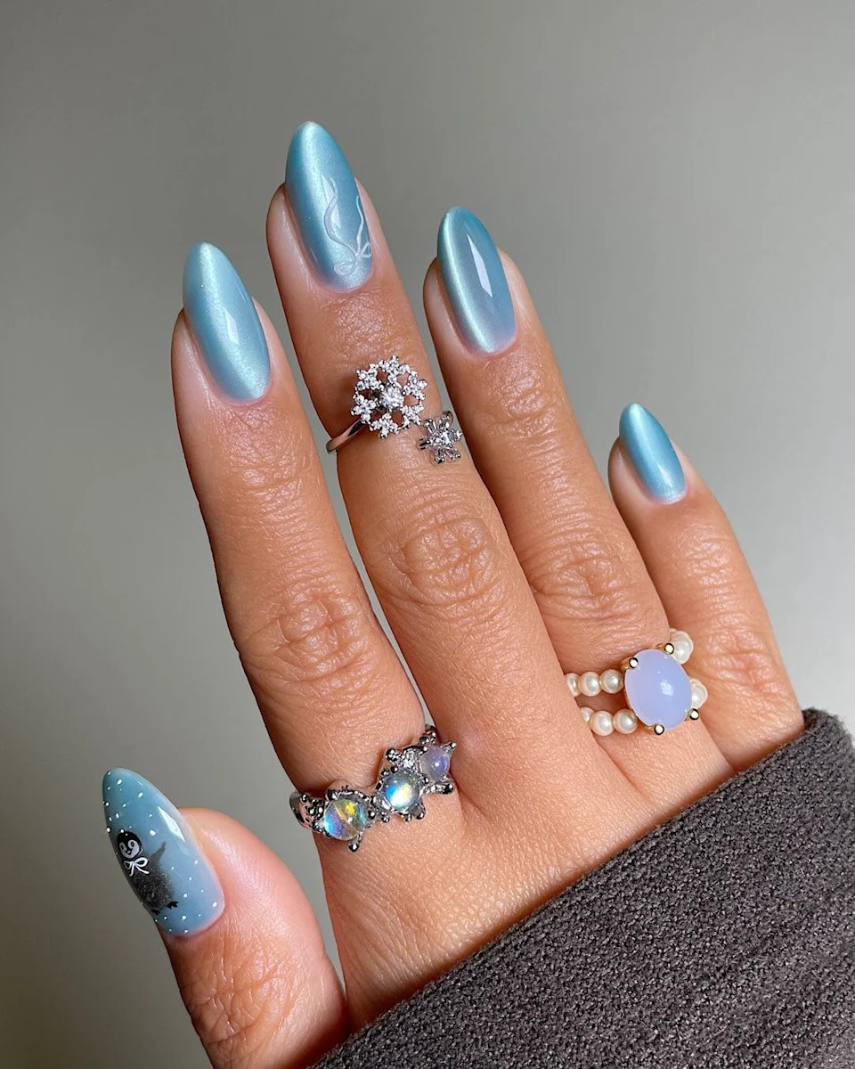Light Blue Cat Eye Nails with Silver Swirls Light Blue Cat Eye Nails with Silver Swirls β Icy Blue Nails