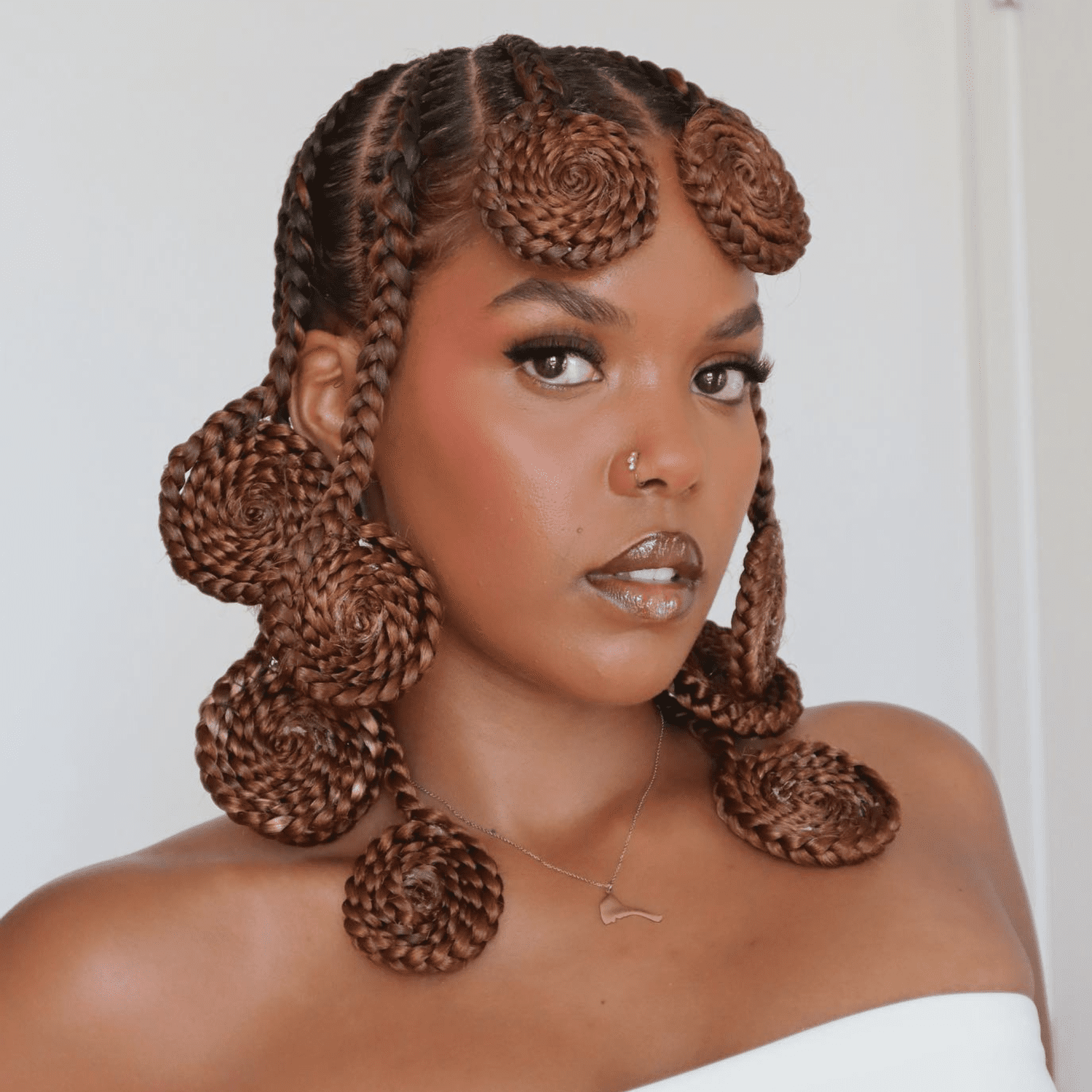 Dark Brown Braids With Coiled Buns Dark Brown Braids With Coiled Buns β Winter Protective Hairstyles