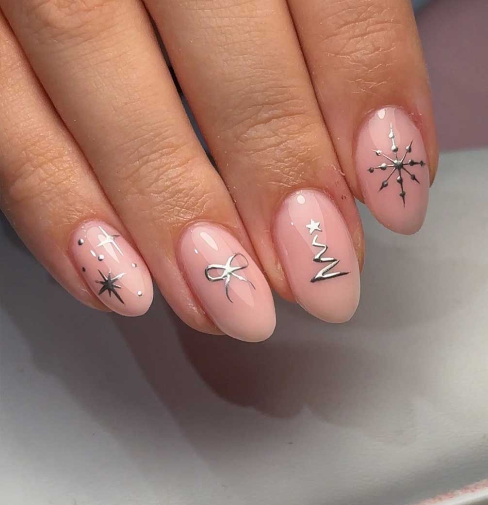 Pale Pink with Silver Foil Holiday Motifs Pale Pink with Silver Foil Holiday Motifs β Winter Party Nails