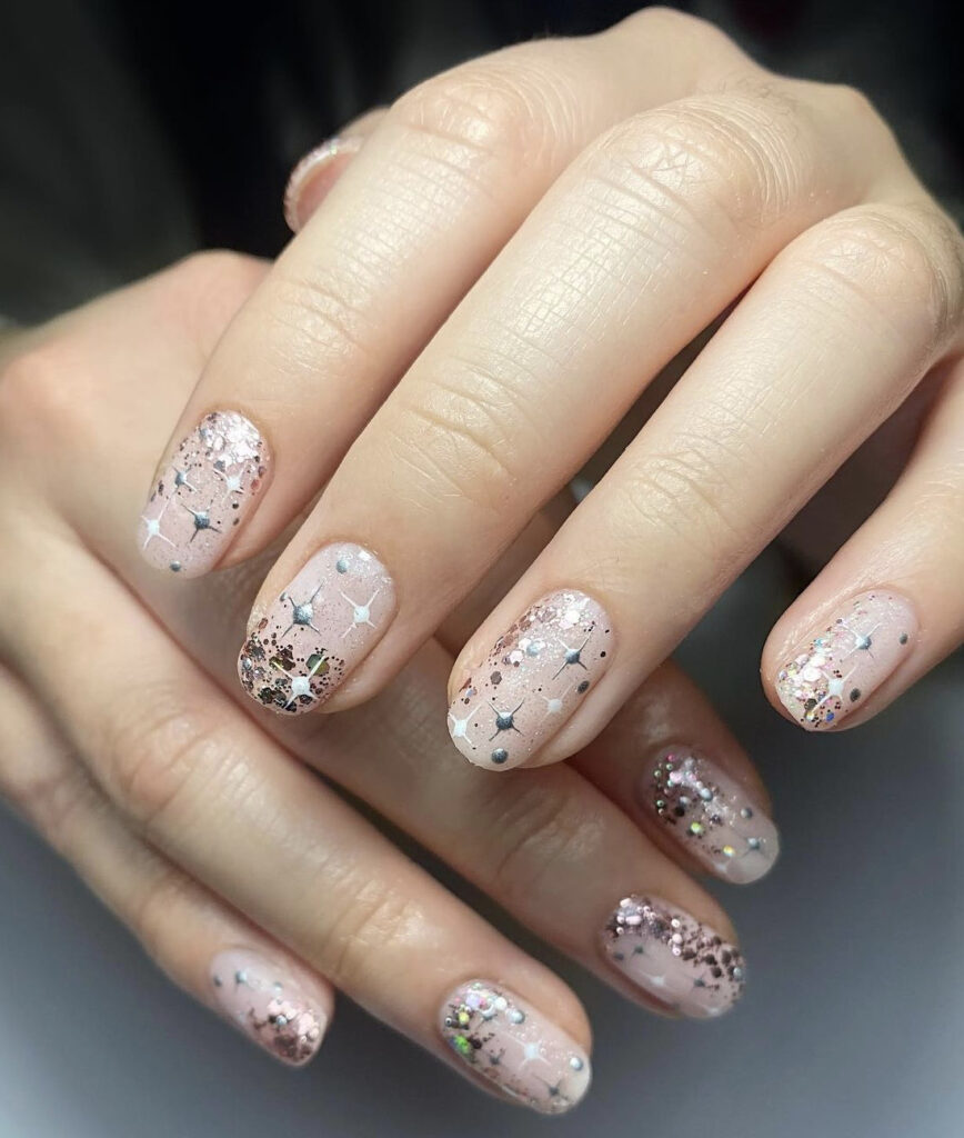 Short Oval Pale Pink with Glitter Starbursts Short Oval Pale Pink with Glitter Starbursts β Sparkly New Years Nails 2027