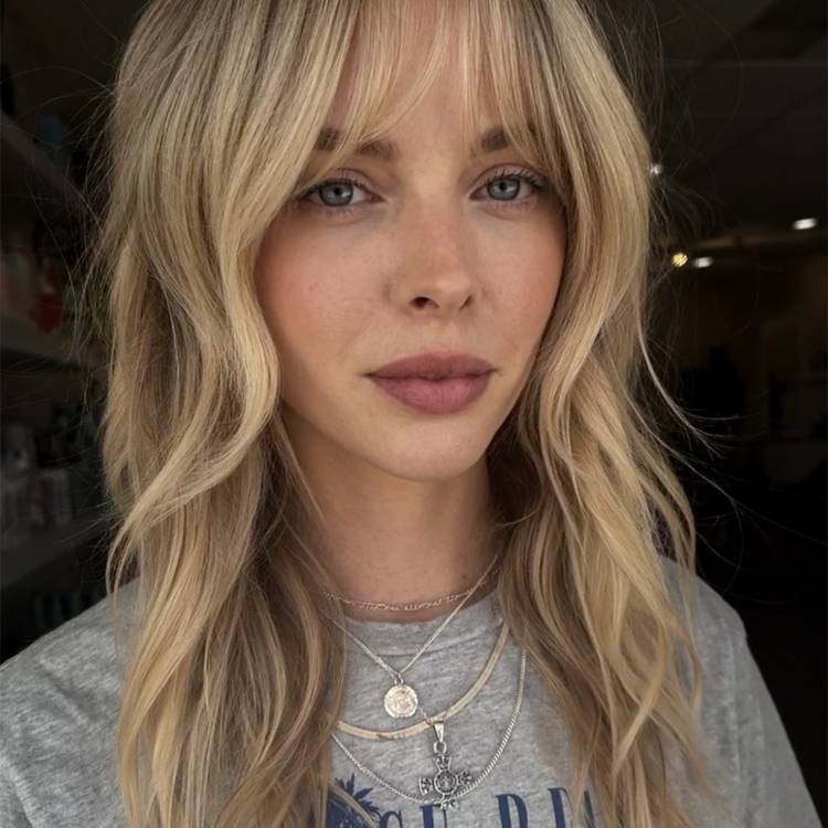 Ash Blonde Shag With Wispy Bangs — Medium Length Winter Haircuts