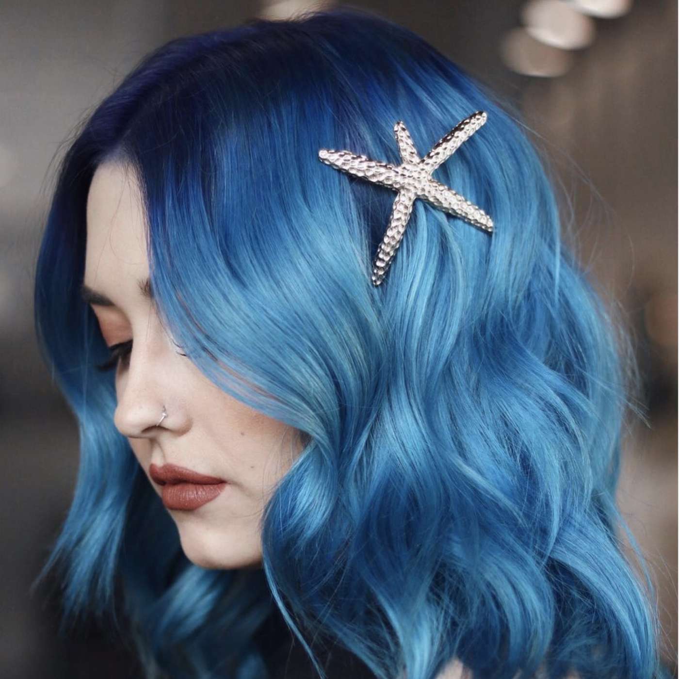 Vibrant Blue Collarbone Layers — Winter Hair Colors for Blue Eyes