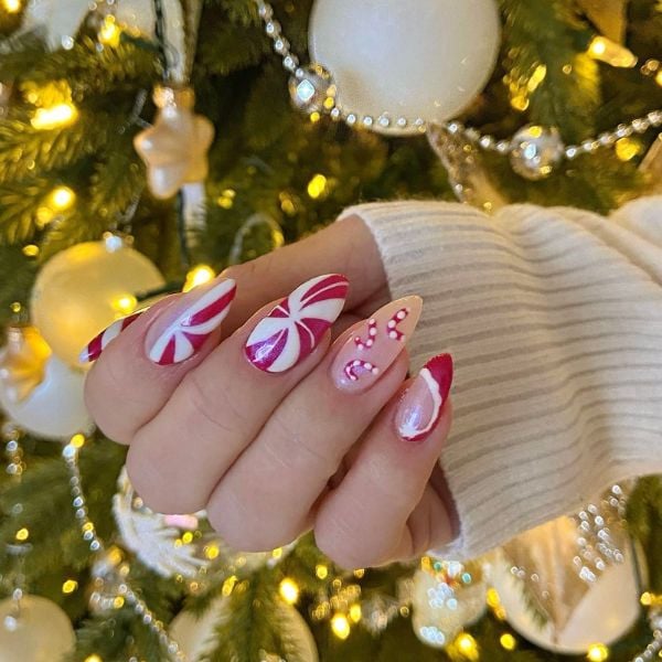 Bold Candy Cane Stripe Stilettos Bold Candy Cane Stripe Stilettos β Simple Christmas Nails 2026