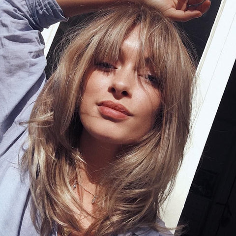 Collarbone Layered Shag Ash Blonde — Winter Haircuts with Curtain Bangs