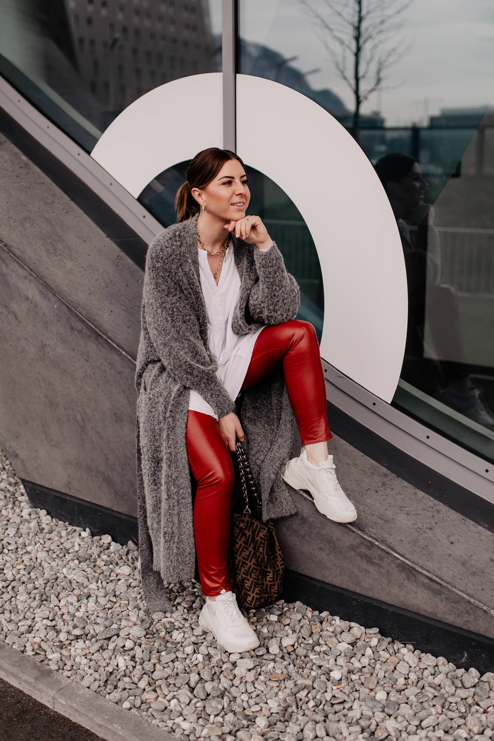 Red Leather Pants with White Shirt, Grey Cardigan, and Sneakers — Leather Pants Outfits