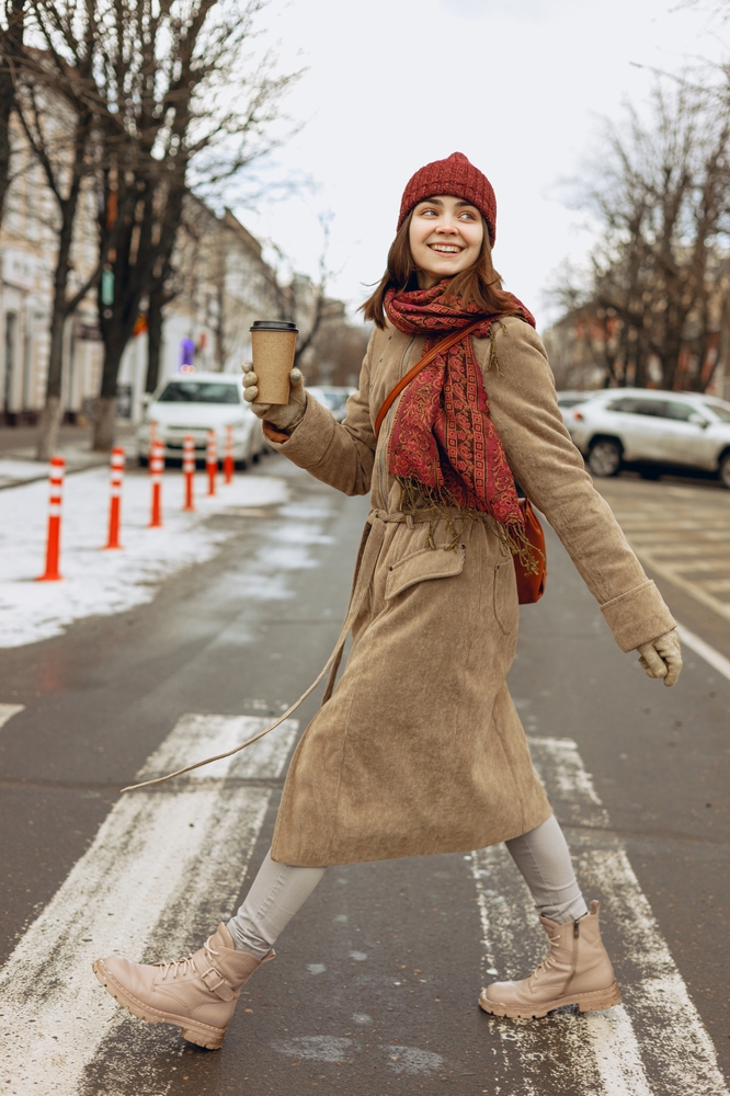 Long Brown Coat Layered with a Red Patterned Scarf — Italy Winter Outfits