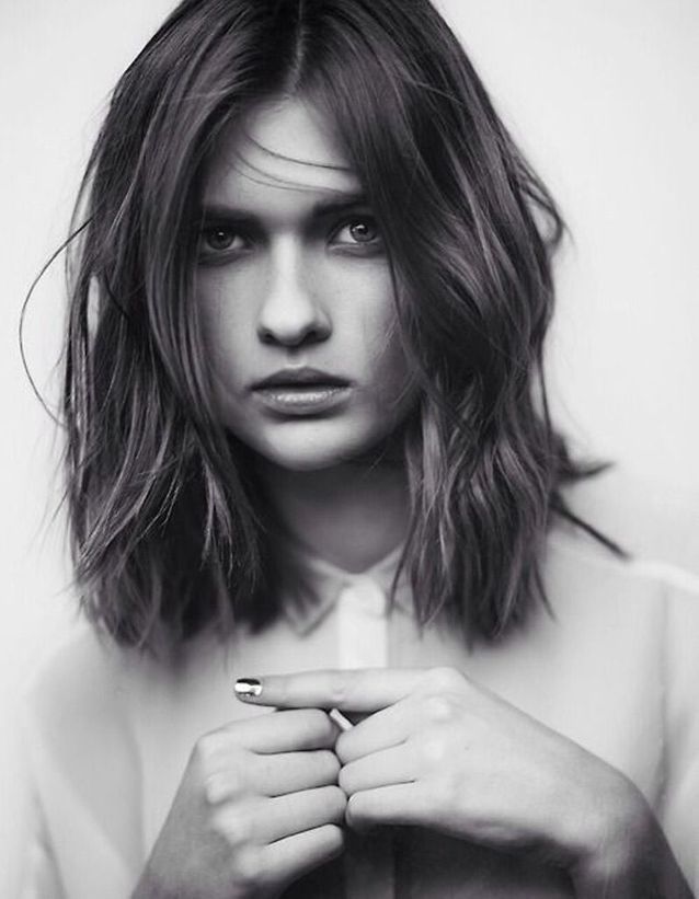 Dark Brown With Subtle Highlights Dark Brown Collarbone Waves With Wispy Bangs — Winter Shoulder Length Hairstyles