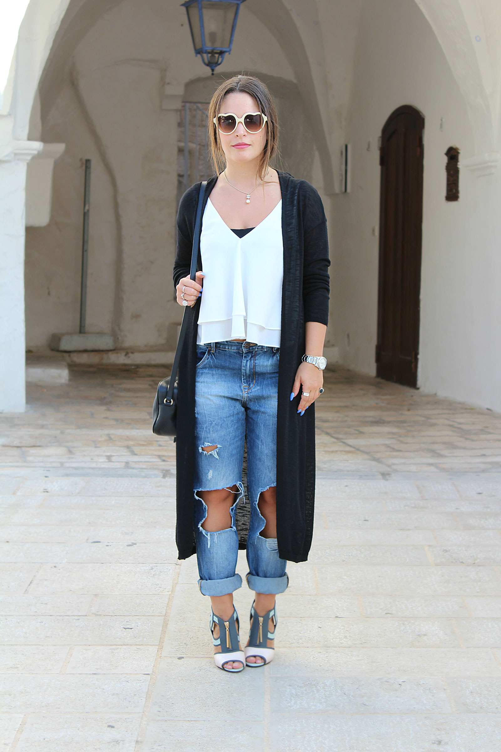 Longline Black Cardigan with Ripped Jeans and Strappy Heels — Cardigan Outfits