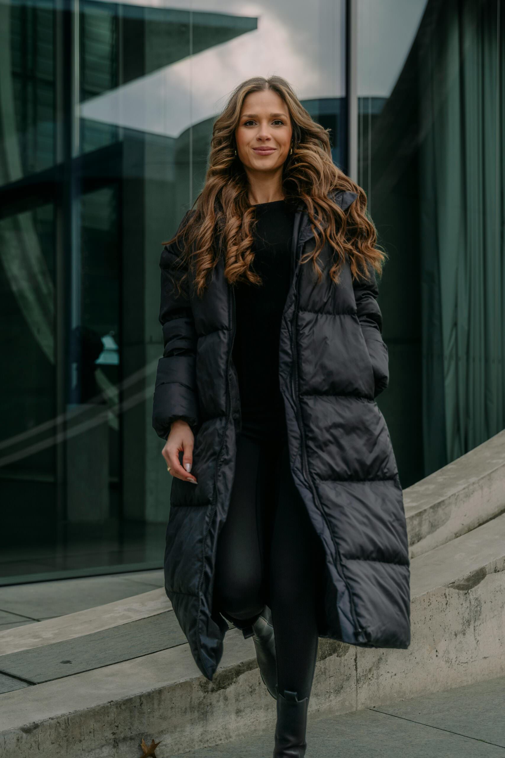Monochromatic Black Long Puffer And Fitted Leggings — Long Puffer Coat Outfits