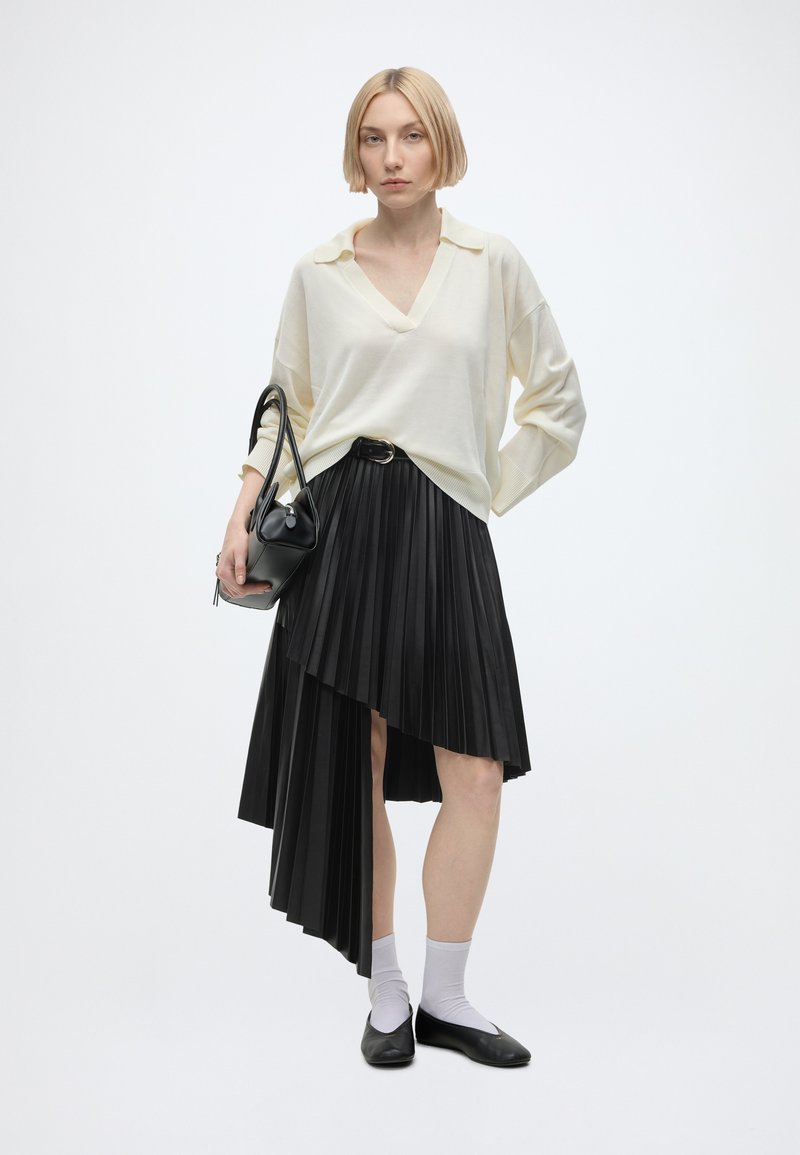 Black Faux Leather Asymmetrical Skirt with Cream Knit Sweater — Leather Skirt Outfits
