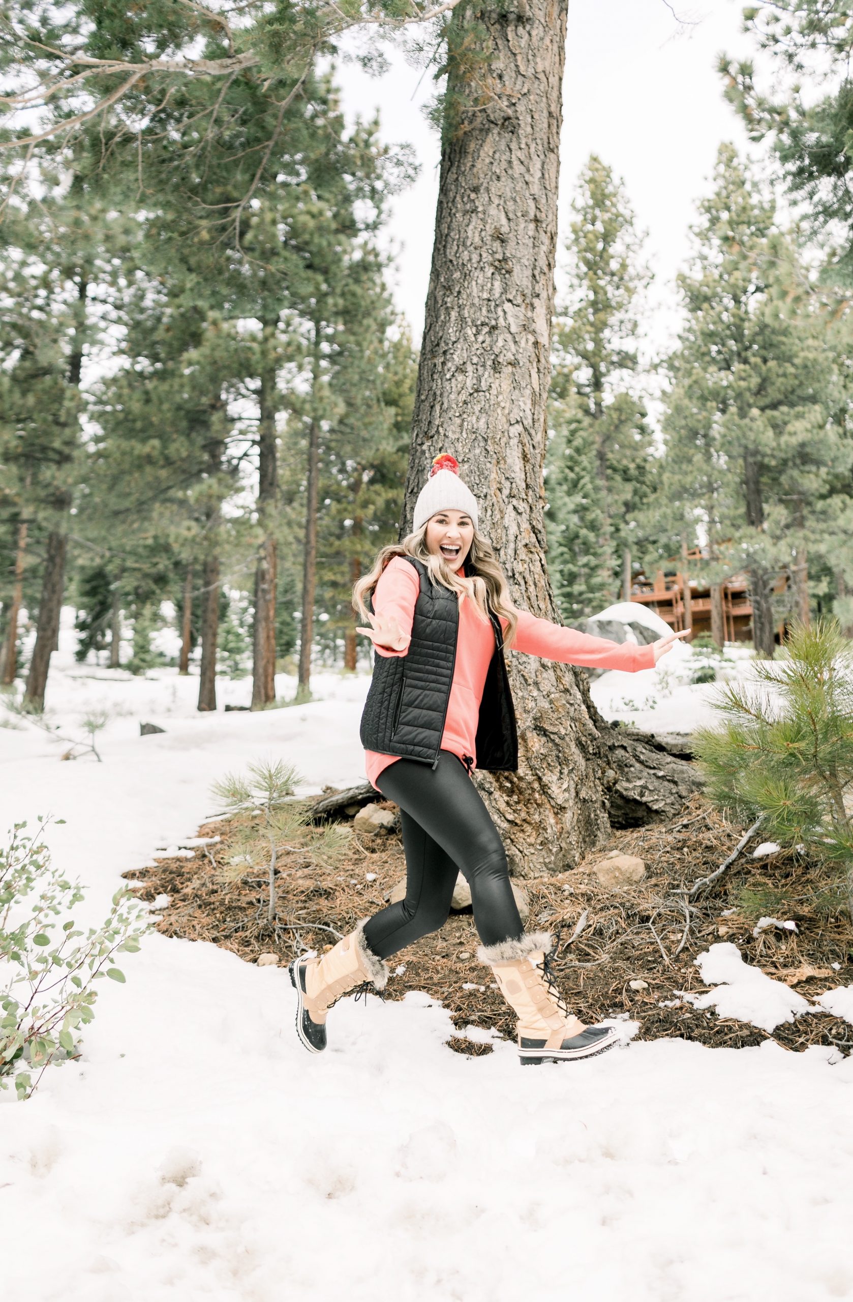Outdoor Winter Fun: Black Faux Leather Leggings with Puffer Vest and Snow Boots Outdoor Winter Fun: Black Faux Leather Leggings with Puffer Vest and Snow Boots β Winter Outfits with Leggings