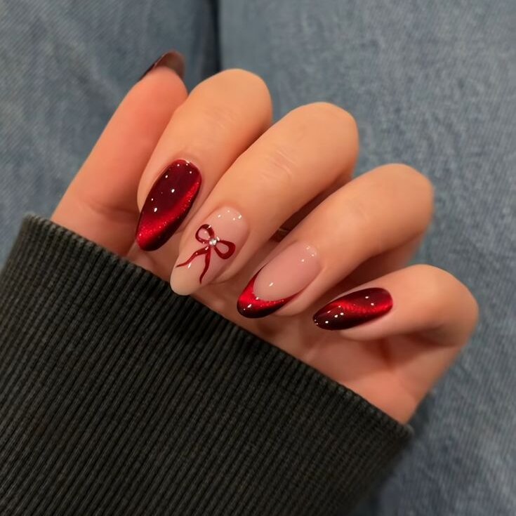 Deep Red Cat-Eye with Bow Accent Deep Red Cat-Eye with Bow Accent β New Years Dip Powder Nails 2027