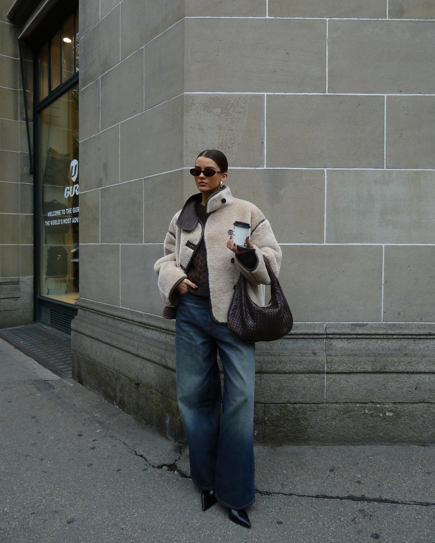Cozy Shearling Jacket with Wide-Leg Denim for Casual Travel — Winter Travel Outfits