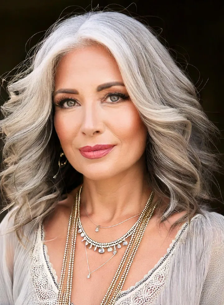 Salt and Pepper Layered Bob With Bangs — Winter Haircuts for Women Over 60
