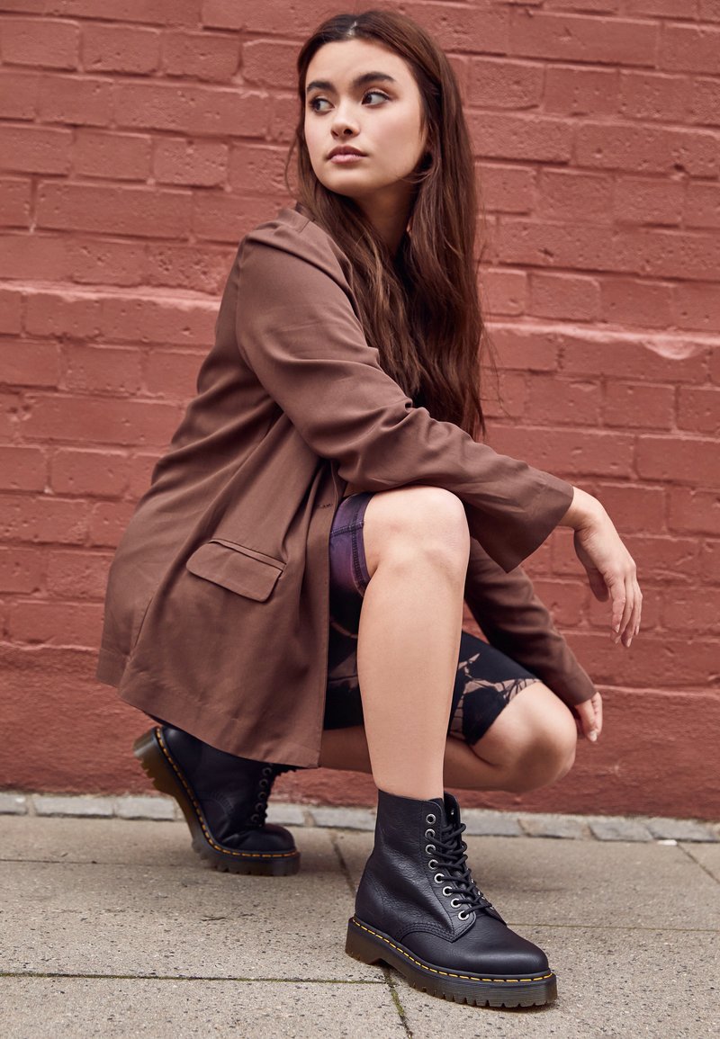 Casual Edge: Printed Dress and Oversized Blazer — Combat Boots Outfits