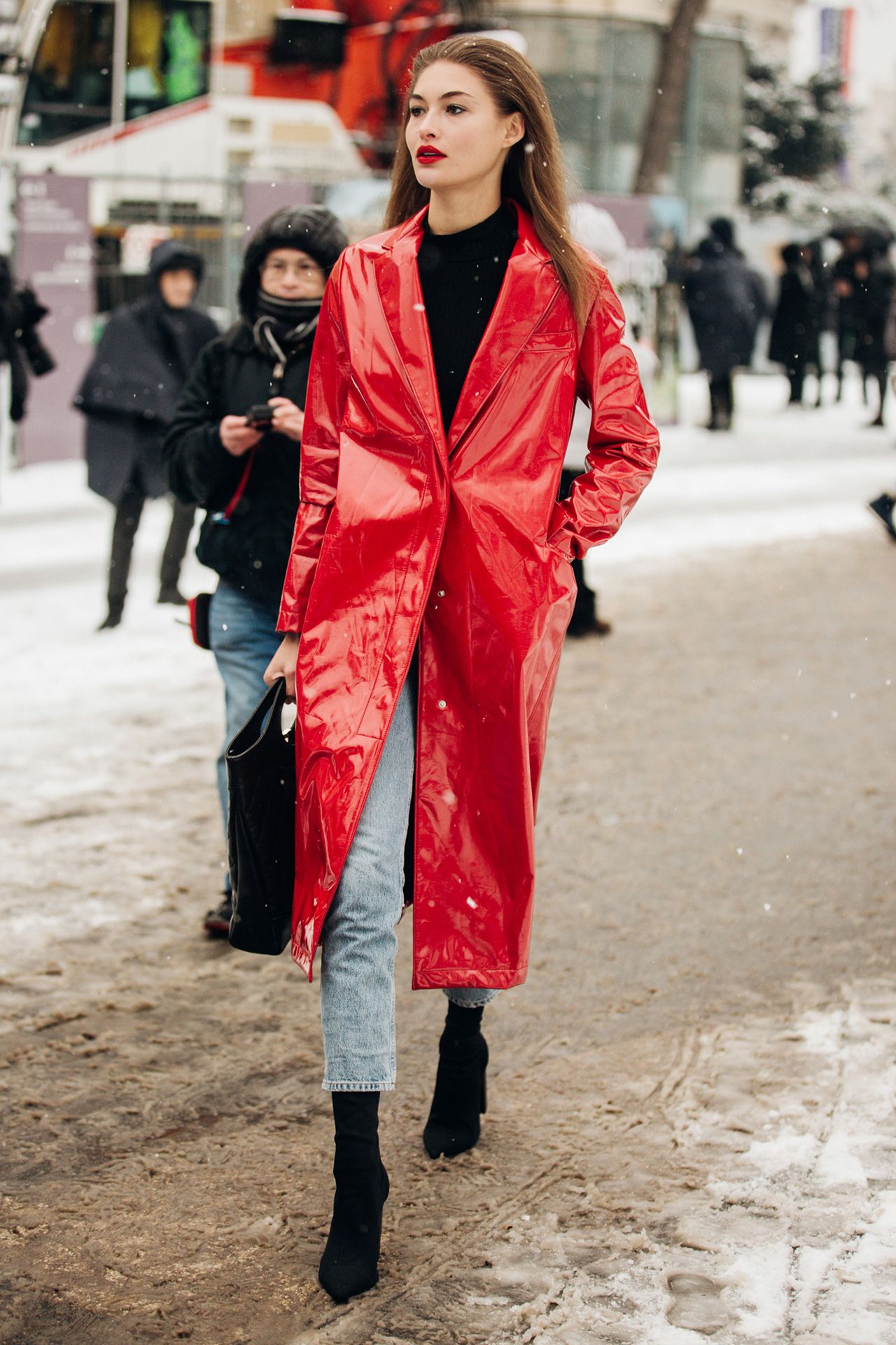Red Vinyl Trench Coat and Black Sock Boots for a Winter City Look — Winter Boots Outfits